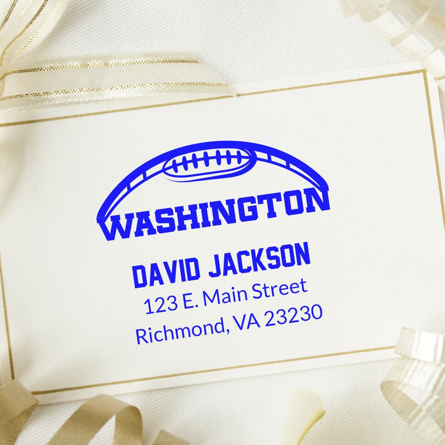 Custom football return address stamp for David Jackson, Richmond, VA, with Washington logo.