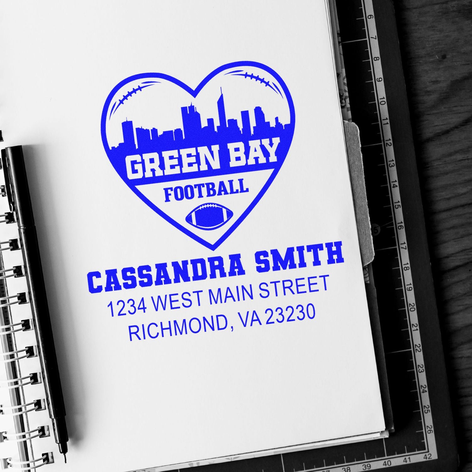 Custom Green Bay Football rubber stamp with heart skyline, name, and return address for personalized stationery.
