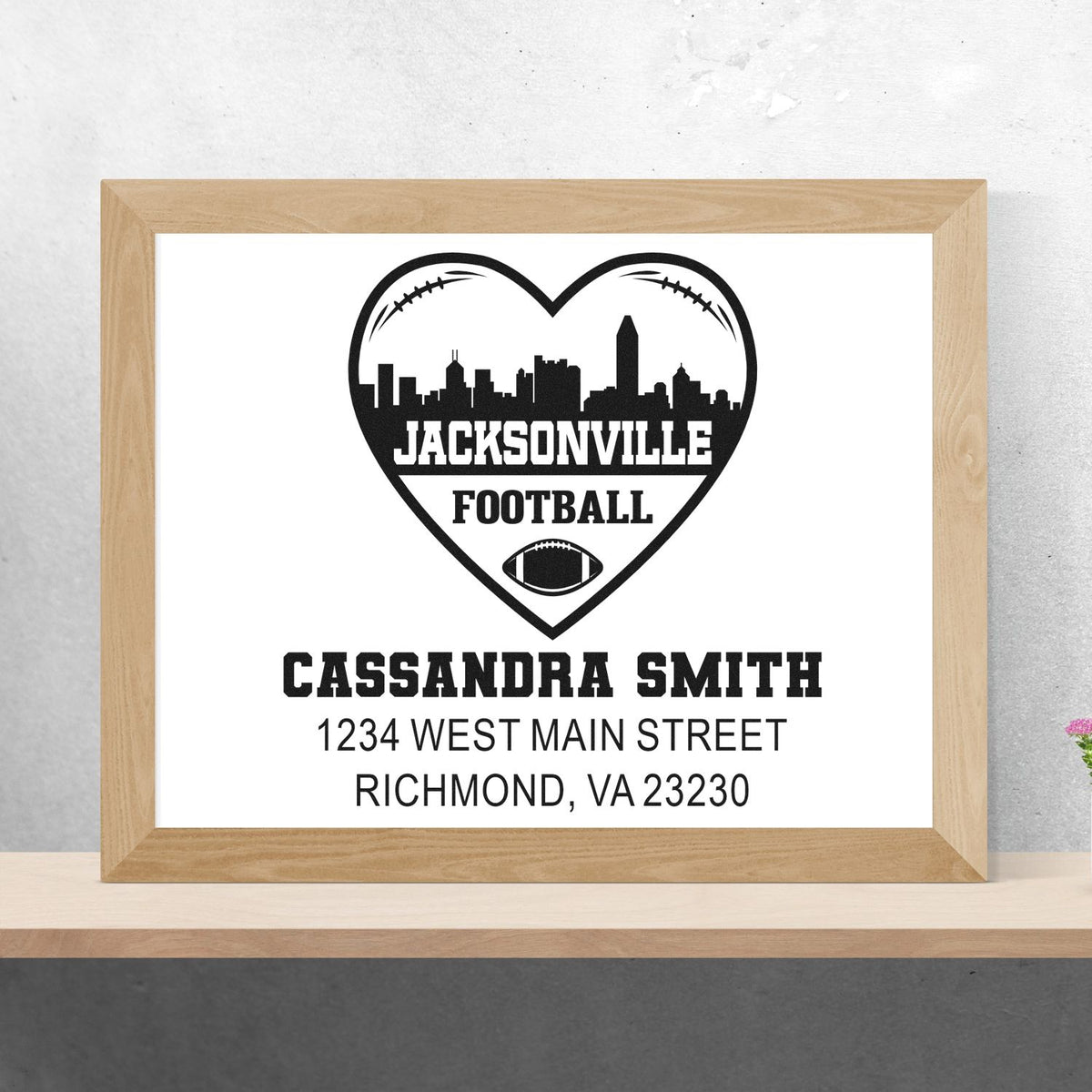 Custom Jacksonville football rubber stamp design with heart skyline, Cassandra Smith name, and Richmond address.