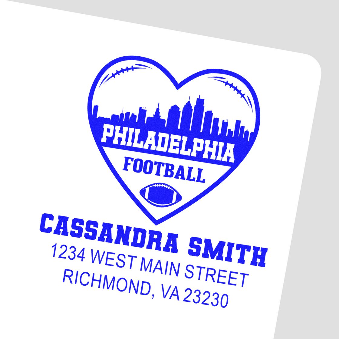 Custom rubber stamp with Philadelphia football heart logo, Cassandra Smith name, and Richmond, VA address.