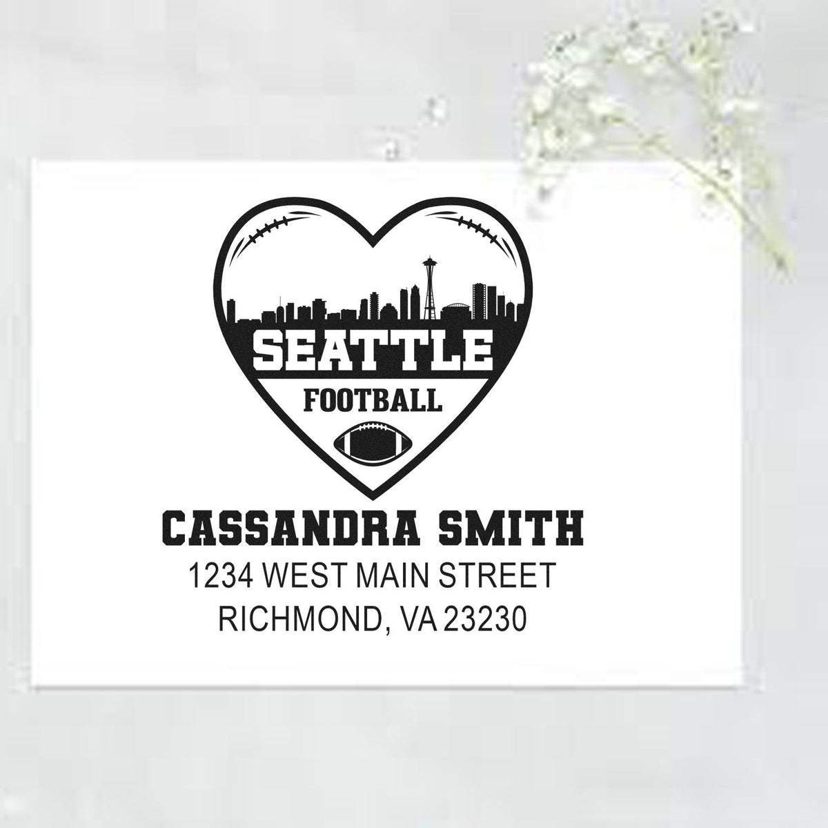 Custom Seattle football return address rubber stamp with heart skyline, Cassandra Smith name, and Richmond, VA address.
