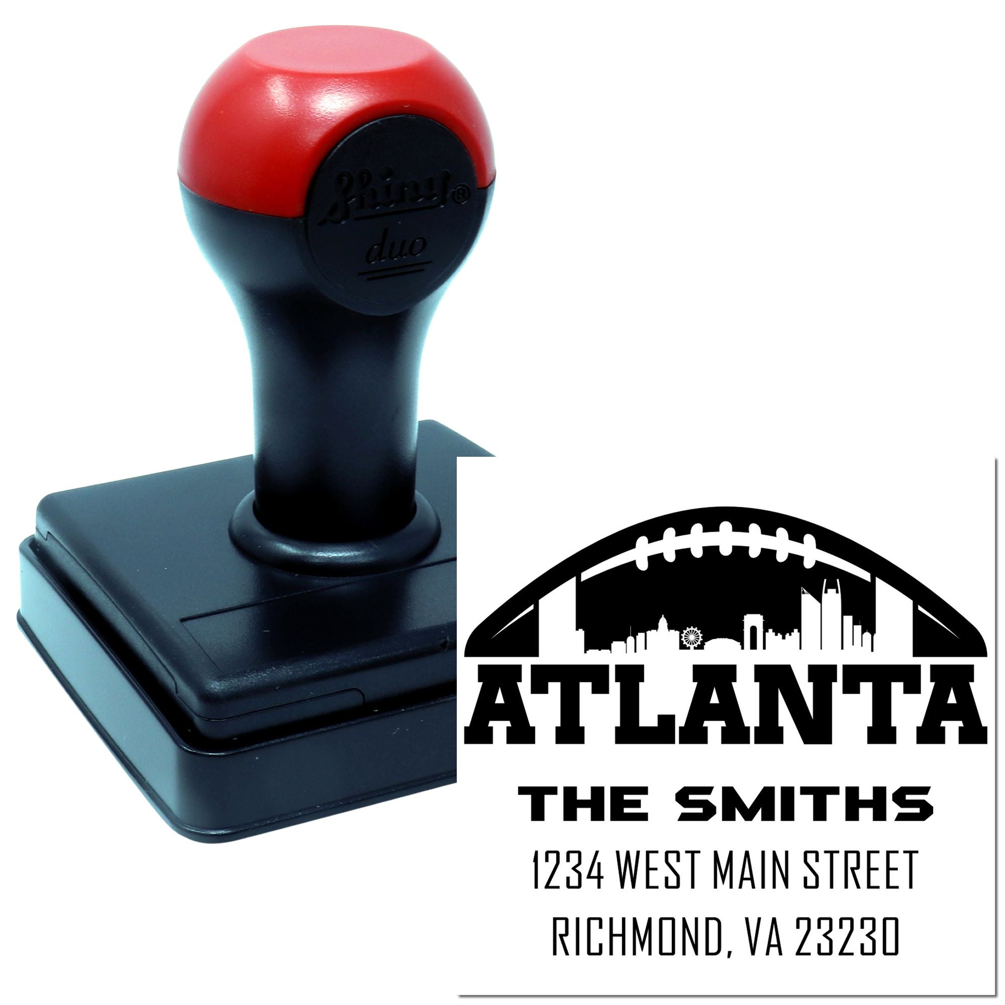 Self-inking Atlanta address rubber stamp with skyline, family name, and return mailing address for personalized mailing labels.