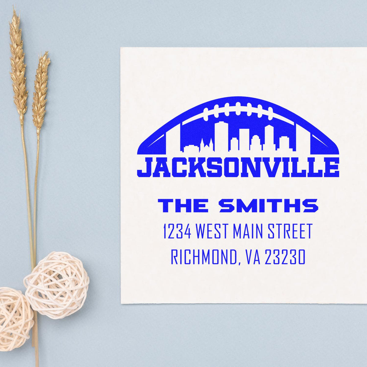 Custom rubber stamp design with Jacksonville football skyline, The Smiths, and personalized return address stamp.