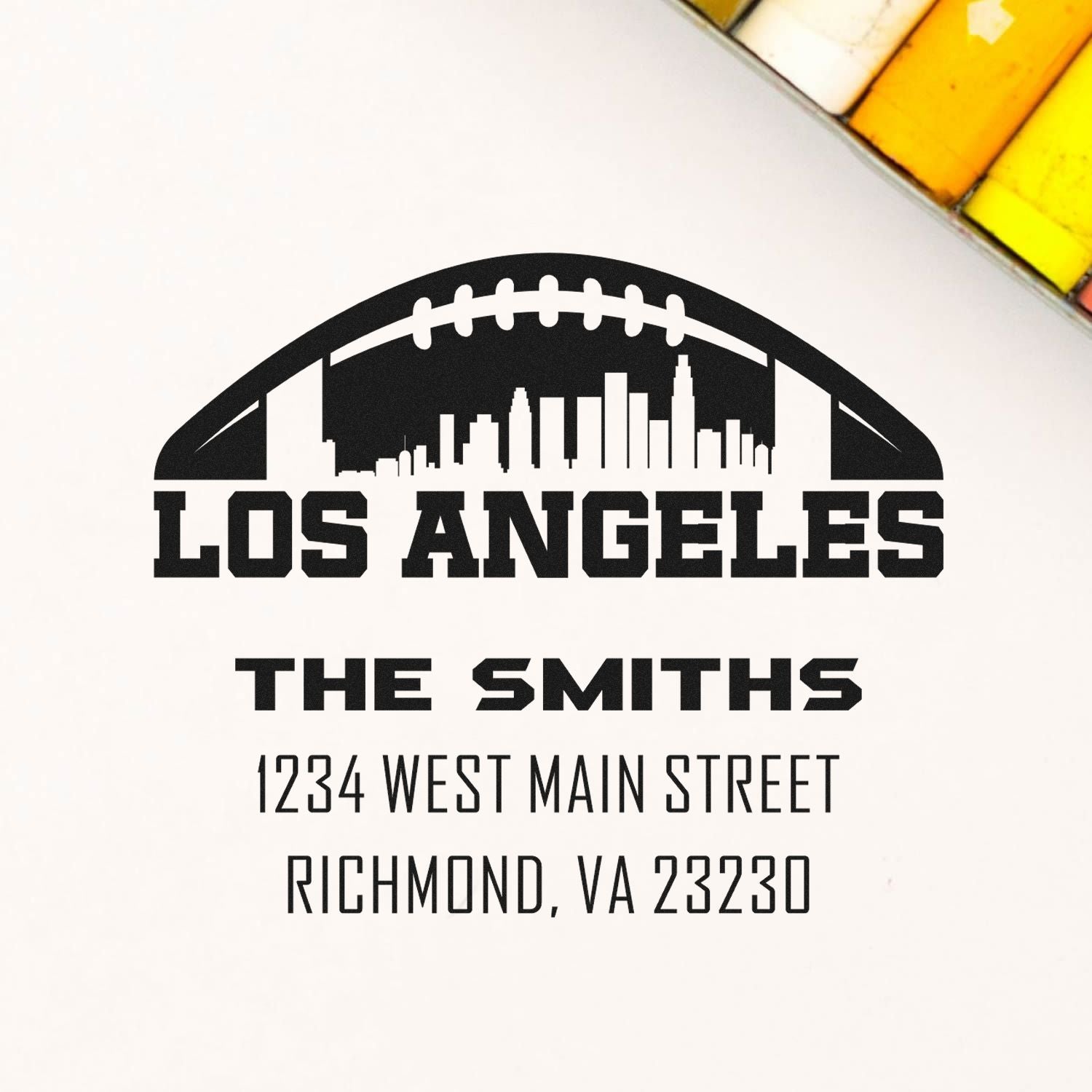 Custom Los Angeles football-themed return address stamp for The Smiths, 1234 West Main Street, Richmond, VA 23230.