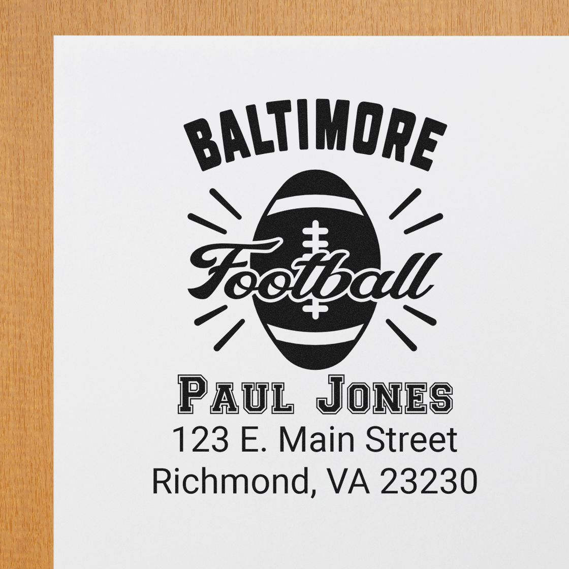 Custom Baltimore football rubber stamp with Paul Jones name and Richmond, VA address for personalized sports mailings.