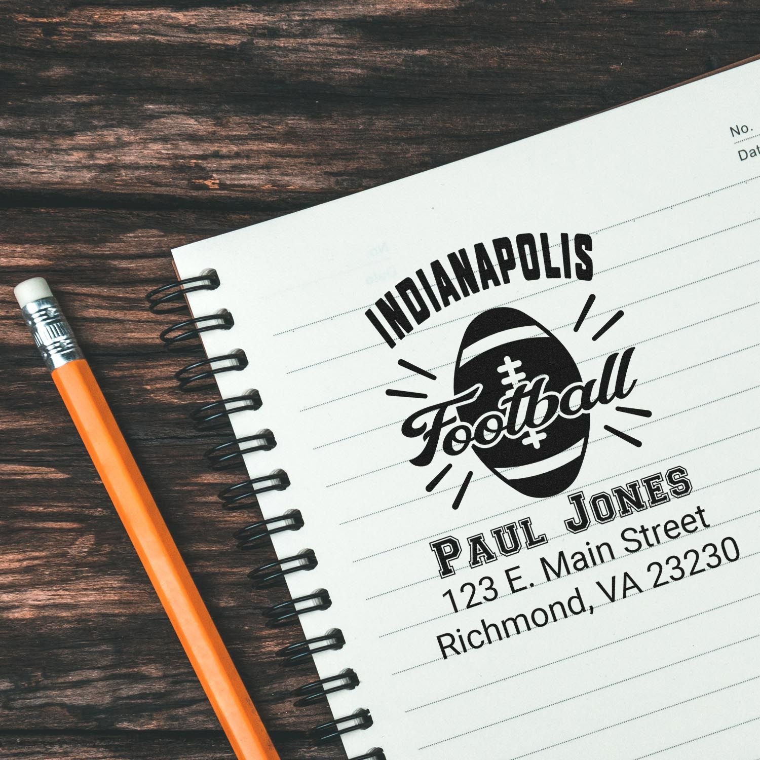 Custom football address rubber stamp for Indianapolis, featuring Paul Jones name and Richmond, VA address on a notebook page