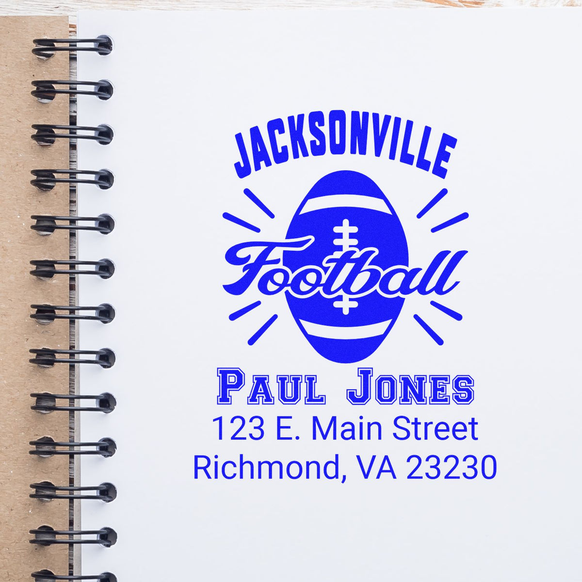 Custom Jacksonville Football rubber stamp with Paul Jones name and Richmond, VA address on a notebook page.