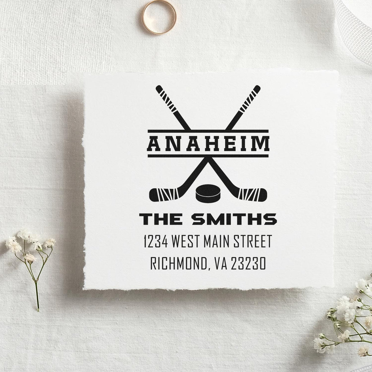 Custom hockey address rubber stamp design with crossed sticks, Anaheim, The Smiths, and Richmond, VA return address.