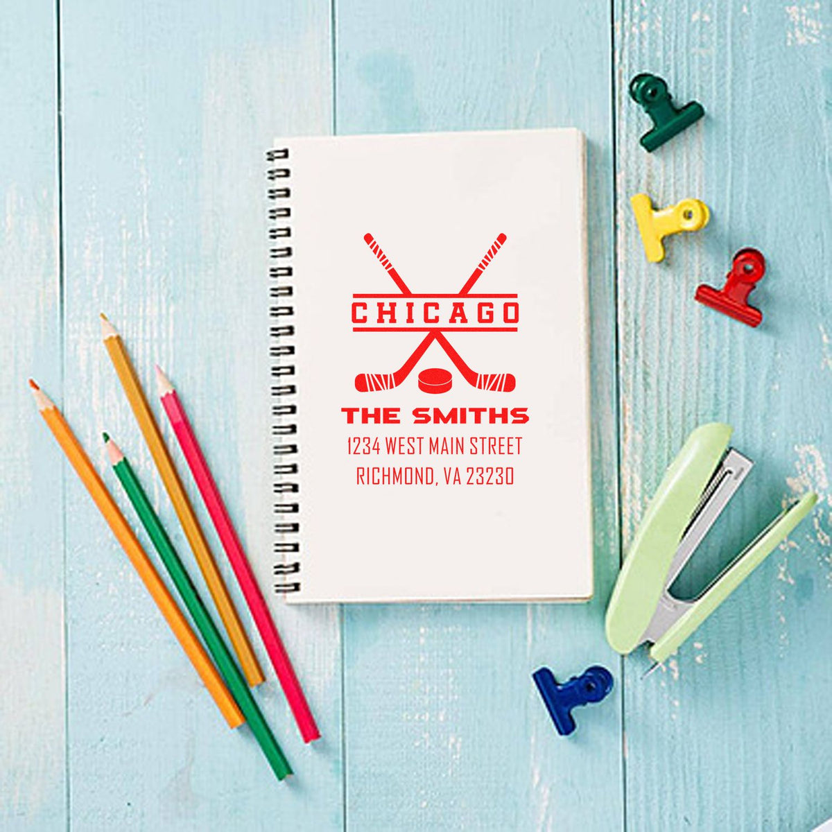 Custom hockey rubber stamp design on notebook with Chicago, The Smiths, and address for personalized stationery