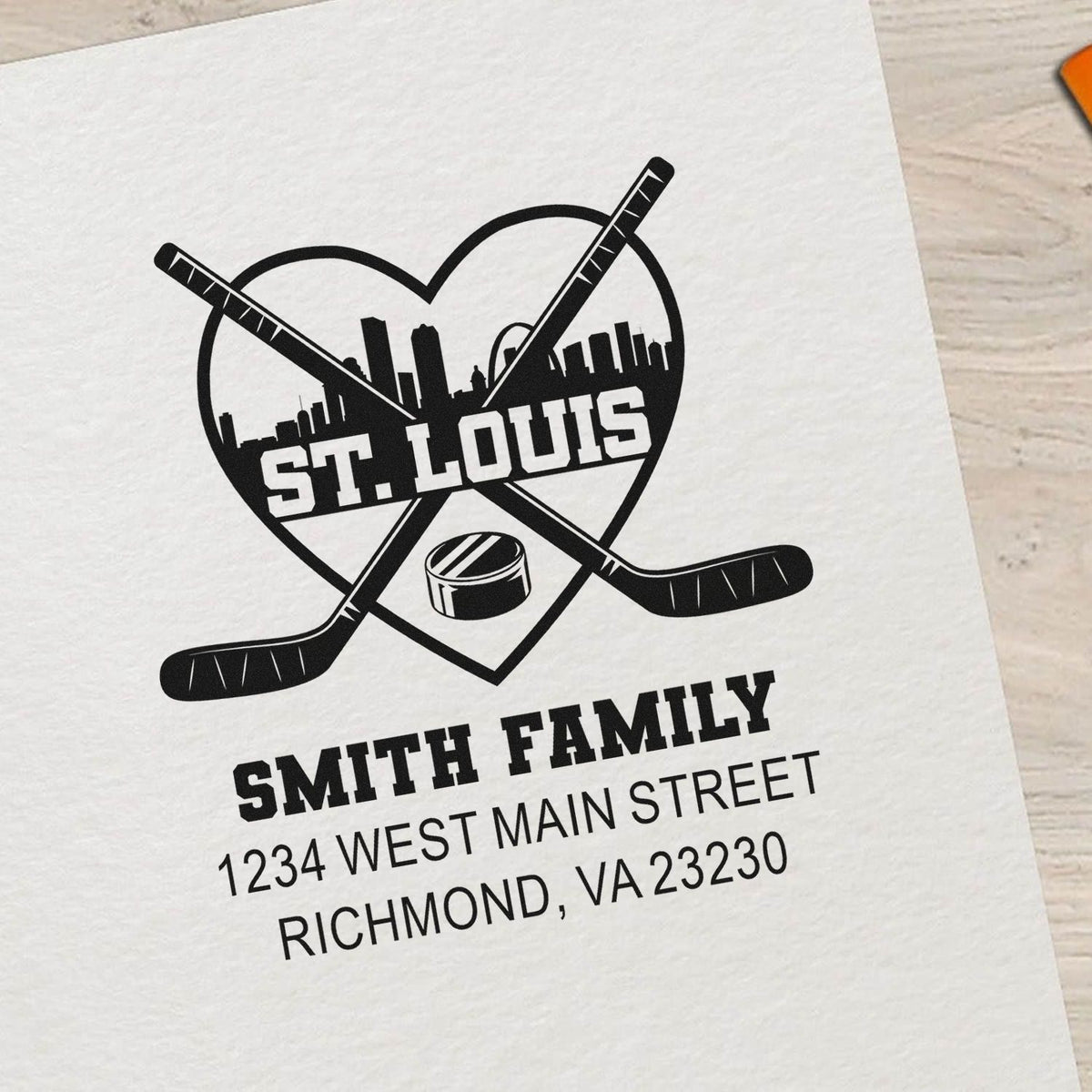 Custom St. Louis family hockey address rubber stamp with crossed sticks, puck, skyline, and return address.