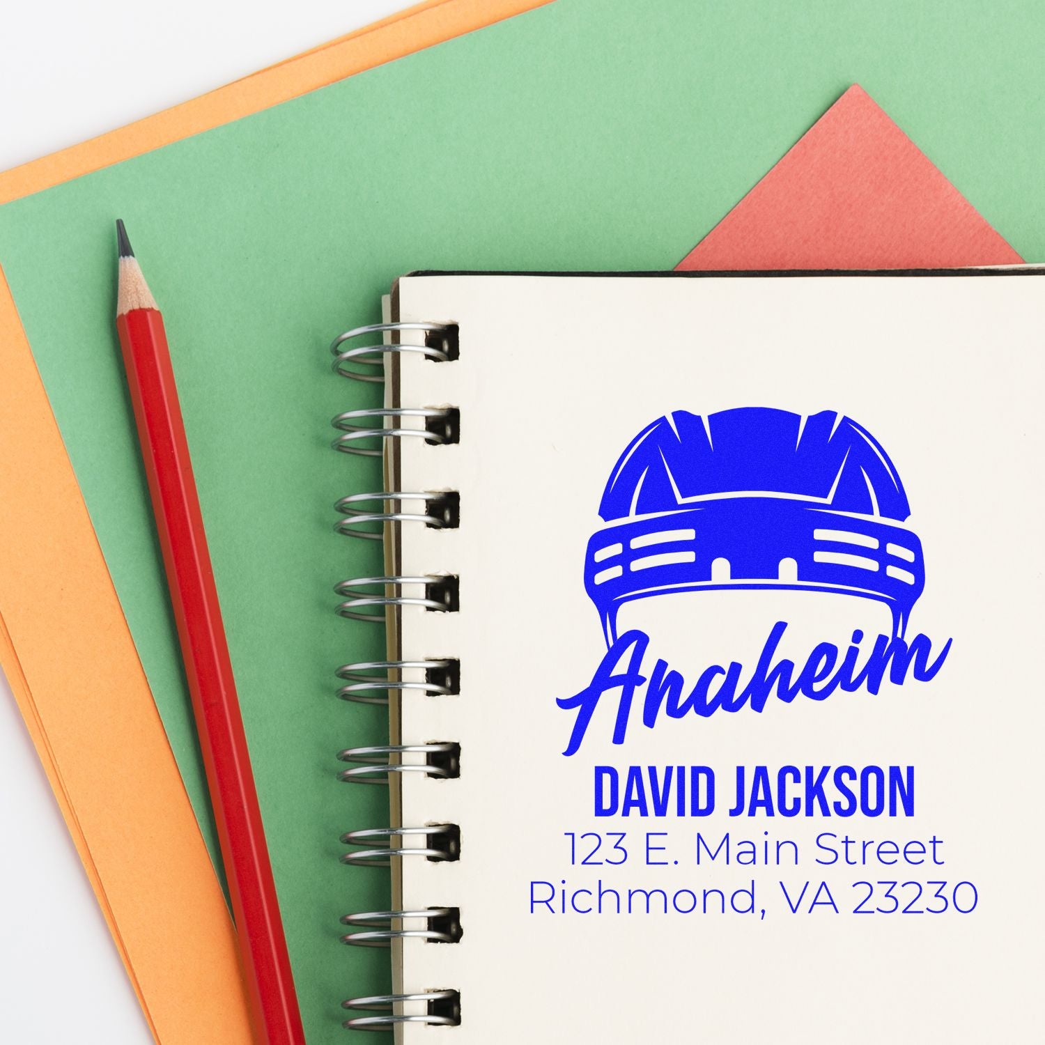 Custom rubber stamp mockup with Anaheim logo, David Jackson name, and address for business branding.