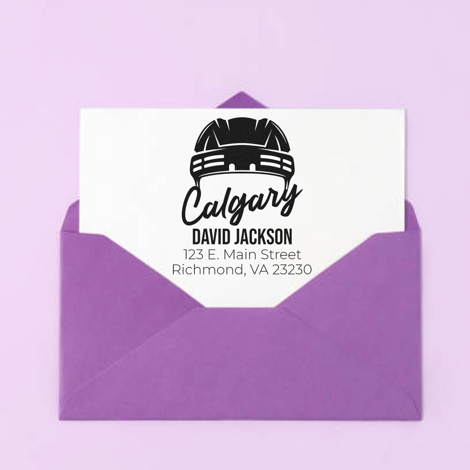 Custom Calgary hockey return address rubber stamp on purple envelope with David Jackson name and Richmond, VA address.