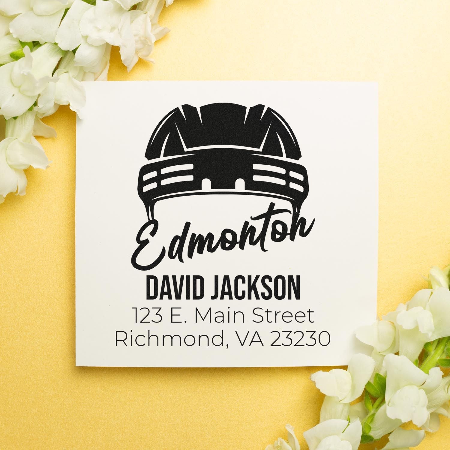 Custom construction rubber stamp with hard hat logo, personalized name, and address for business branding or mailing.