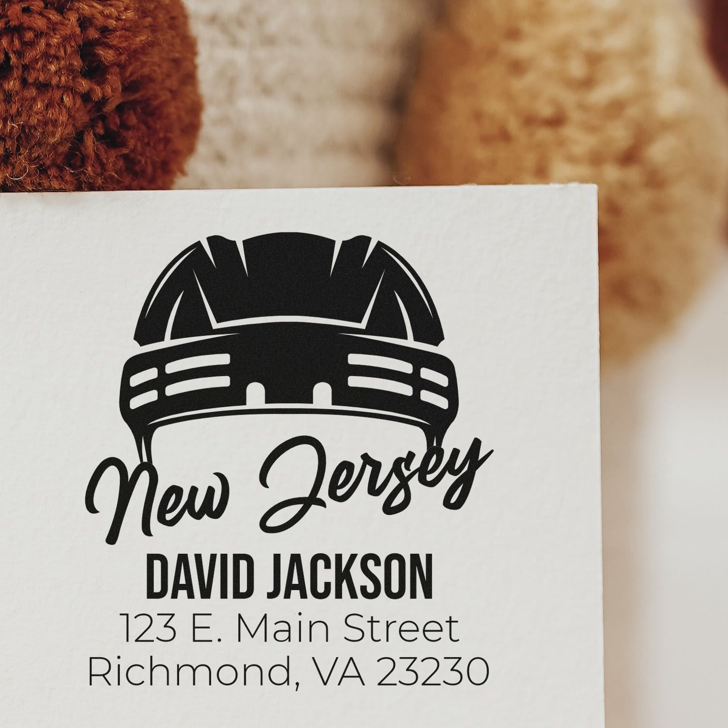 Personalized rubber stamp design with hard hat logo, New Jersey name, and return address for David Jackson in Richmond, VA.