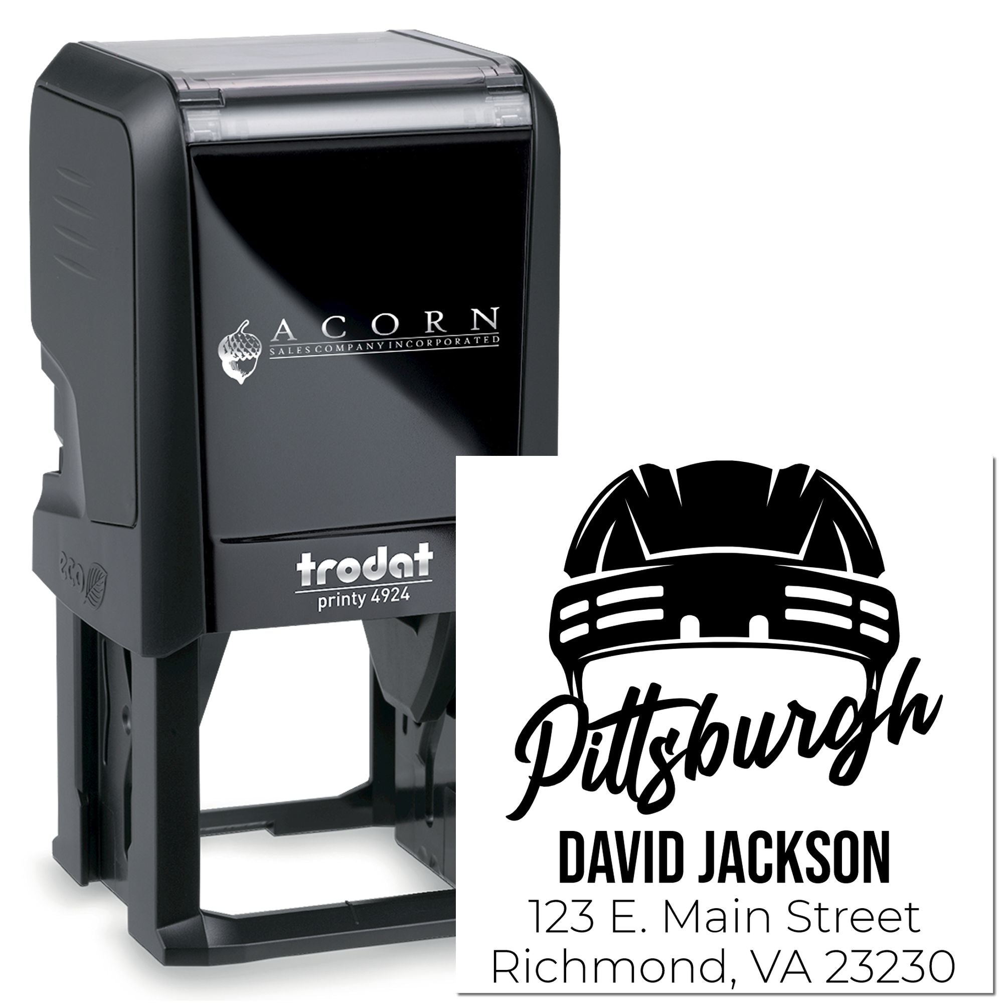 Custom Trodat self-inking rubber stamp with Pittsburgh logo, name, and address for business branding and mailing.