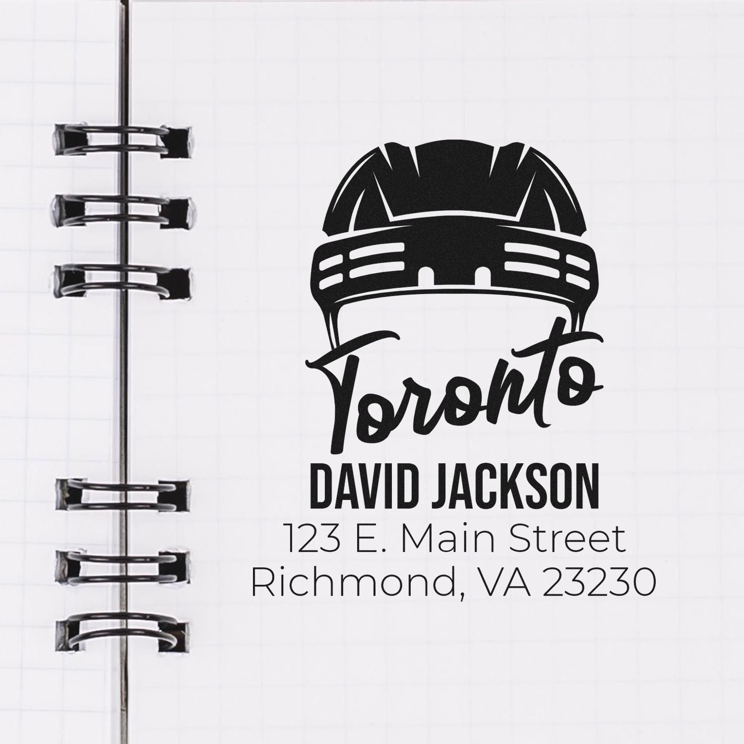 Custom Toronto hard hat rubber stamp with name, address and notebook mockup for personalized business branding.