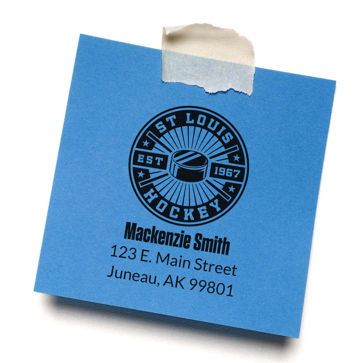 Custom hockey address rubber stamp impression with logo, name, and mailing address on blue paper.