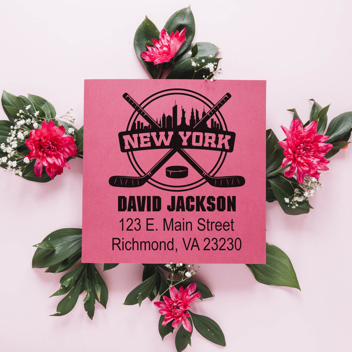 Personalized hockey rubber stamp with New York skyline, crossed sticks, and custom name and address for stationery.