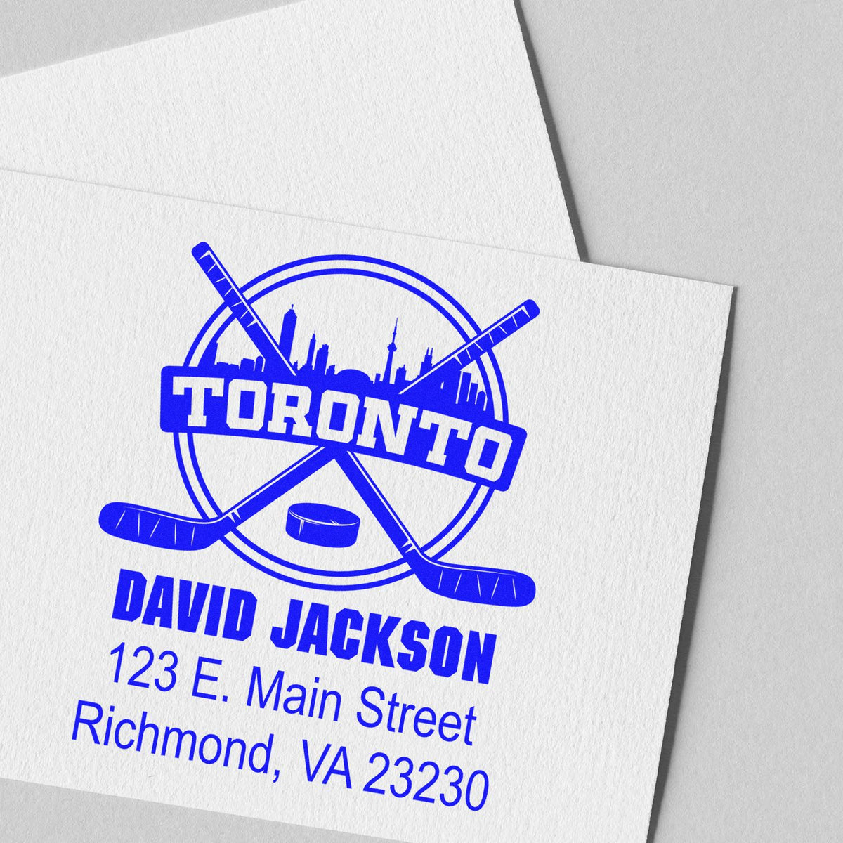 Custom hockey rubber stamp with Toronto logo, David Jackson name, and Richmond, VA address for business branding.