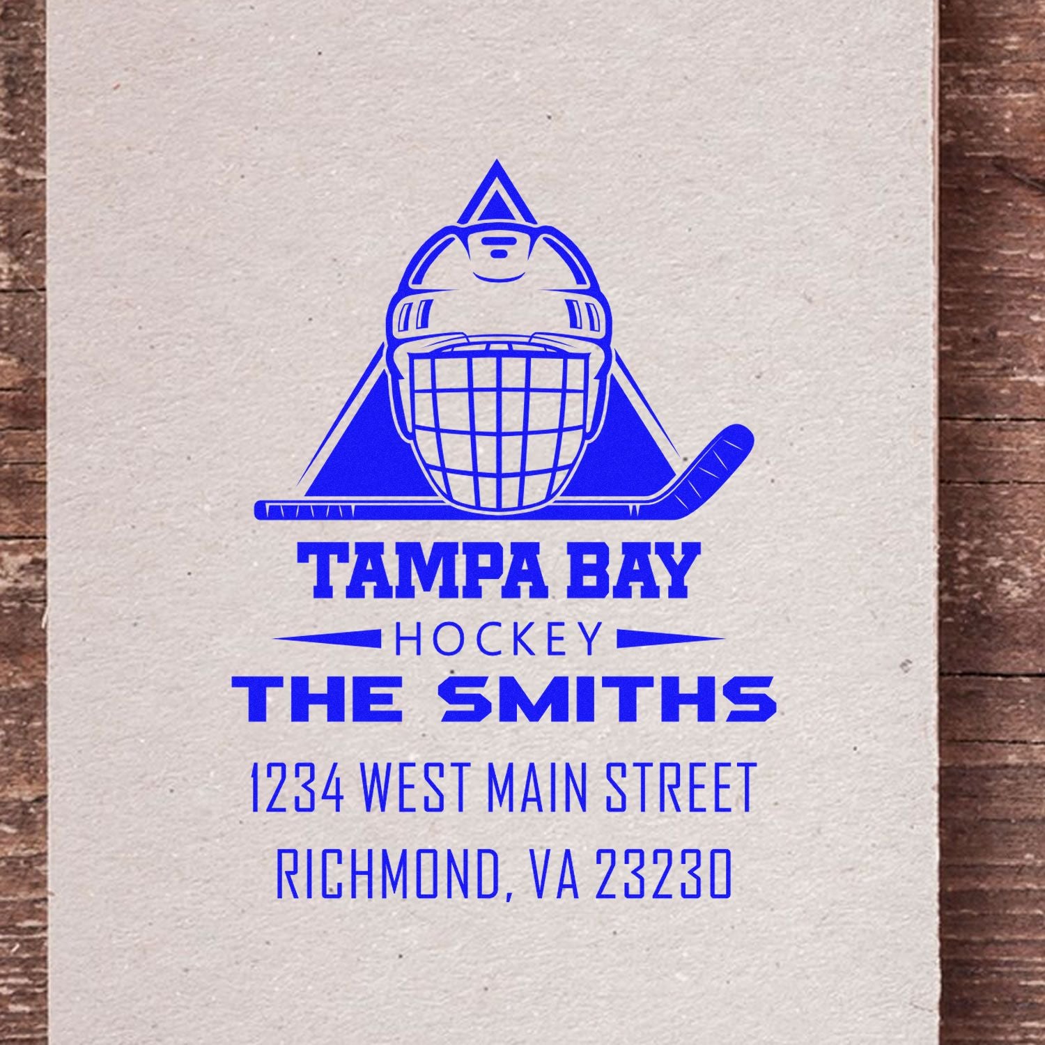 Custom Tampa Bay Hockey address rubber stamp with goalie mask, hockey stick, The Smiths family name, and mailing address.