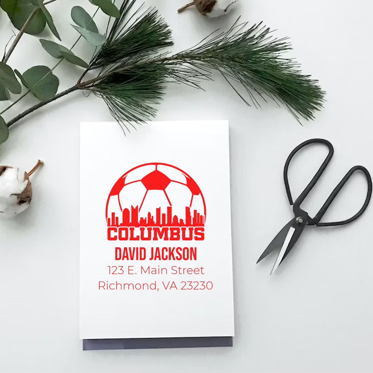 Personalized Columbus skyline return address rubber stamp mockup with name and address on stationery.