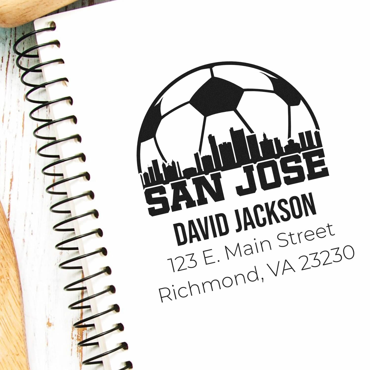 Custom rubber address stamp with soccer ball and city skyline design for San Jose, featuring David Jacksons return address.