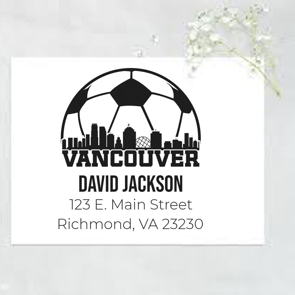 Custom Vancouver rubber stamp with soccer skyline, return address for David Jackson, 123 E. Main Street, Richmond, VA 23230