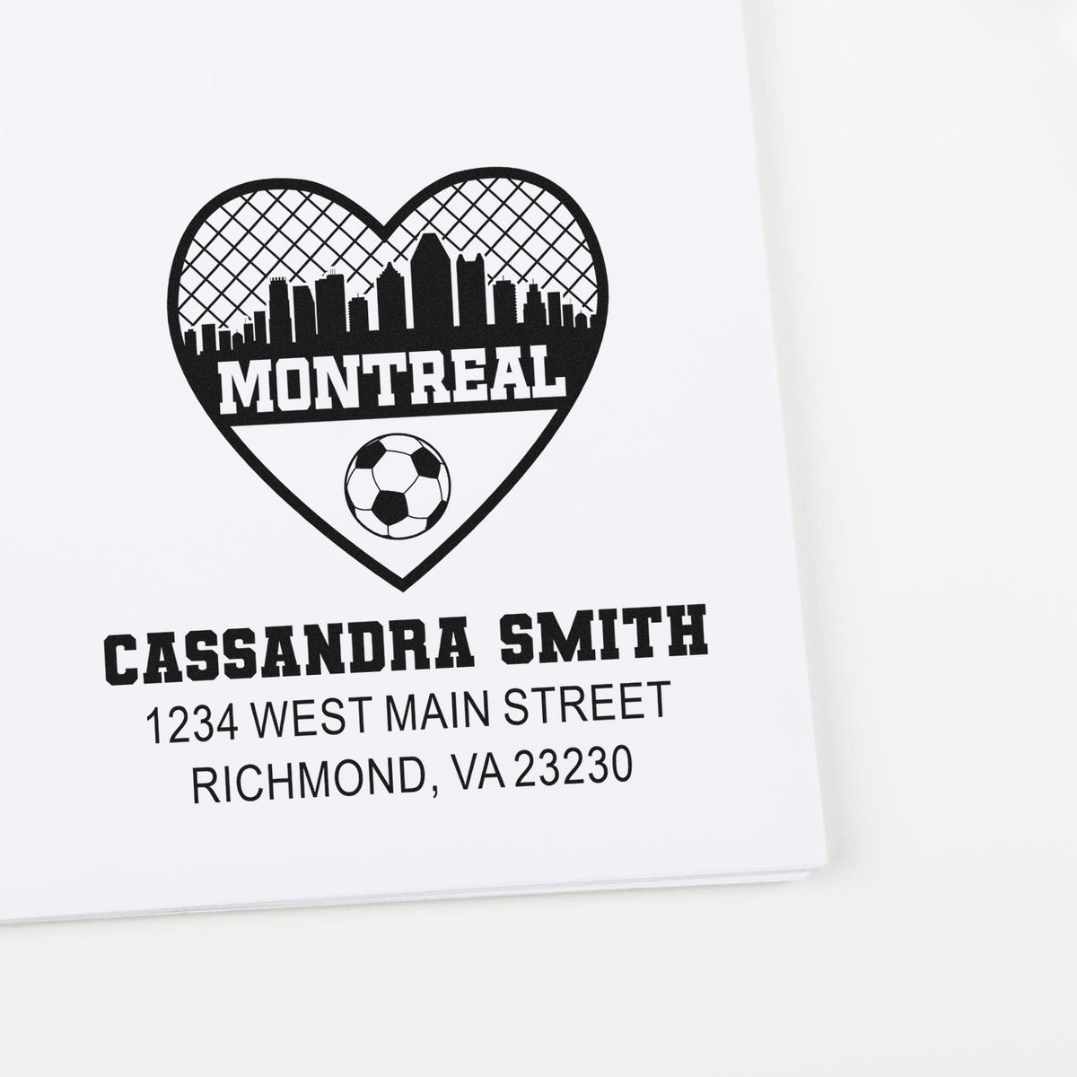Custom return address rubber stamp with Montreal skyline heart, soccer ball, and personalized name and address.