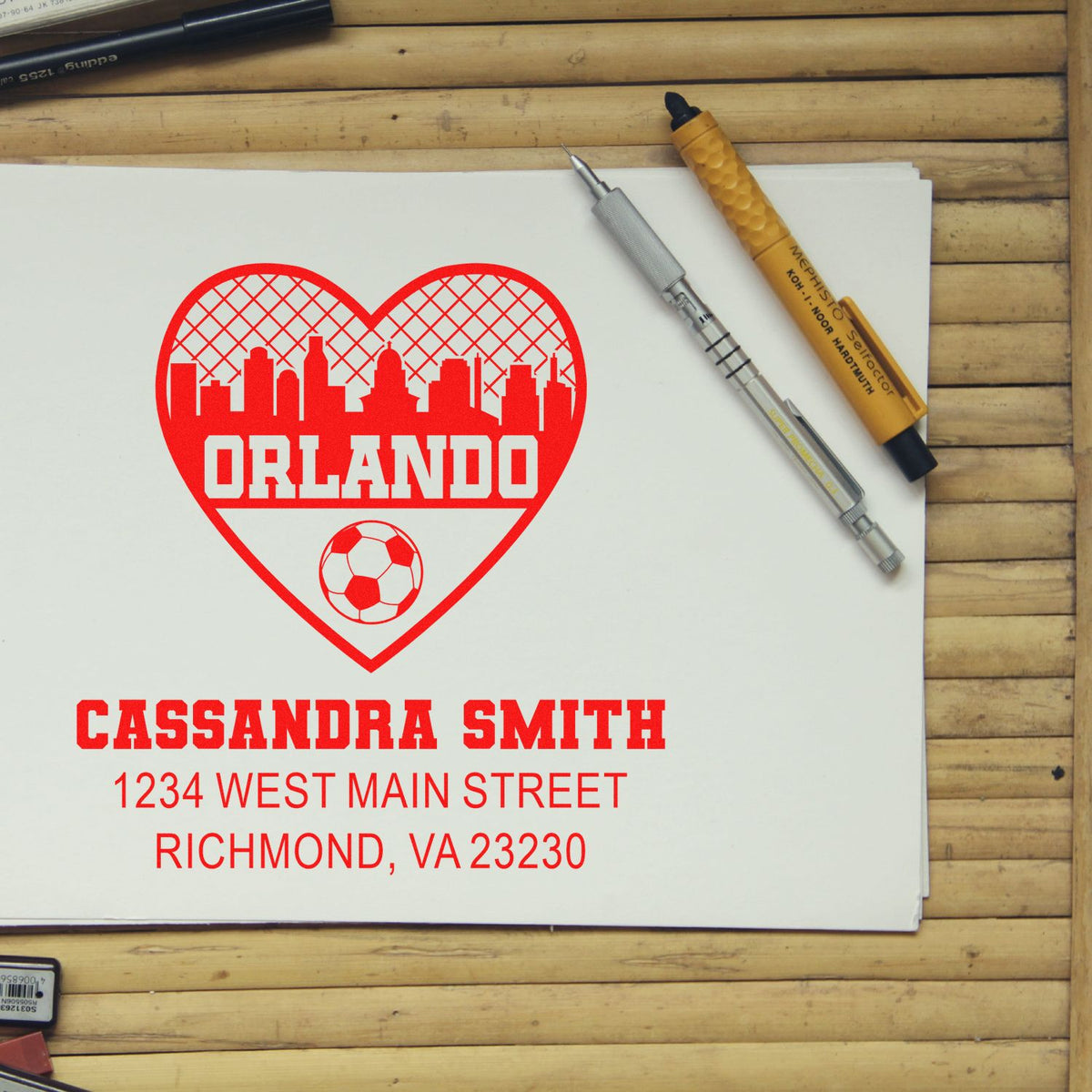 Custom rubber stamp design with Orlando heart skyline, soccer ball, and personalized name and address.