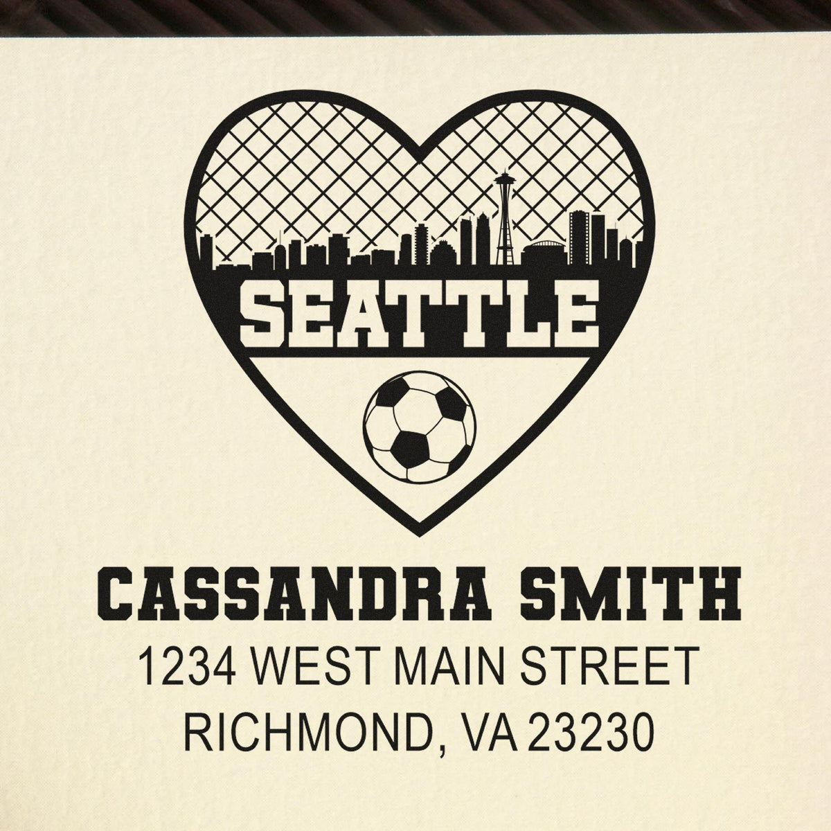 Custom Seattle soccer return address rubber stamp with heart skyline, name, and address.