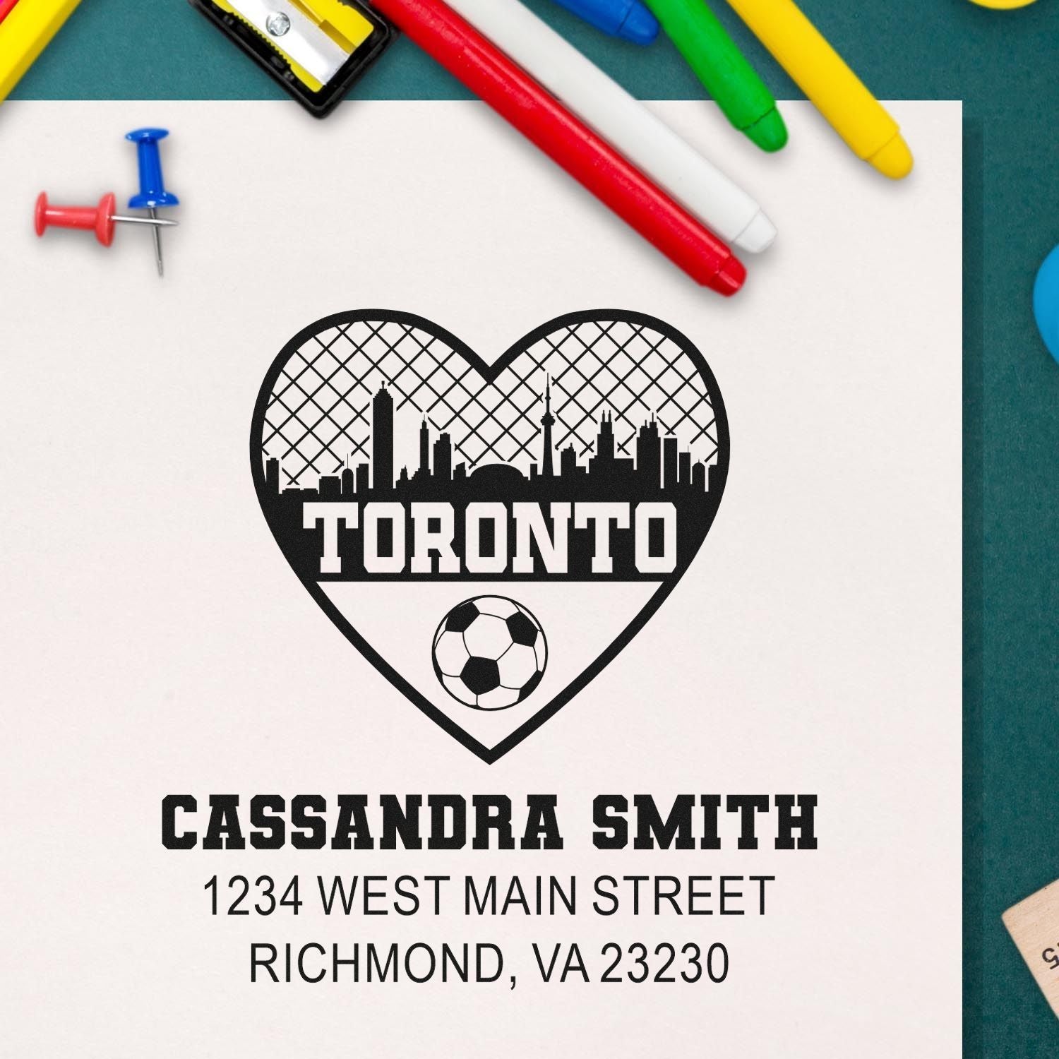 Custom personalized rubber stamp design with Toronto heart skyline, soccer ball, and return address for Cassandra Smith.