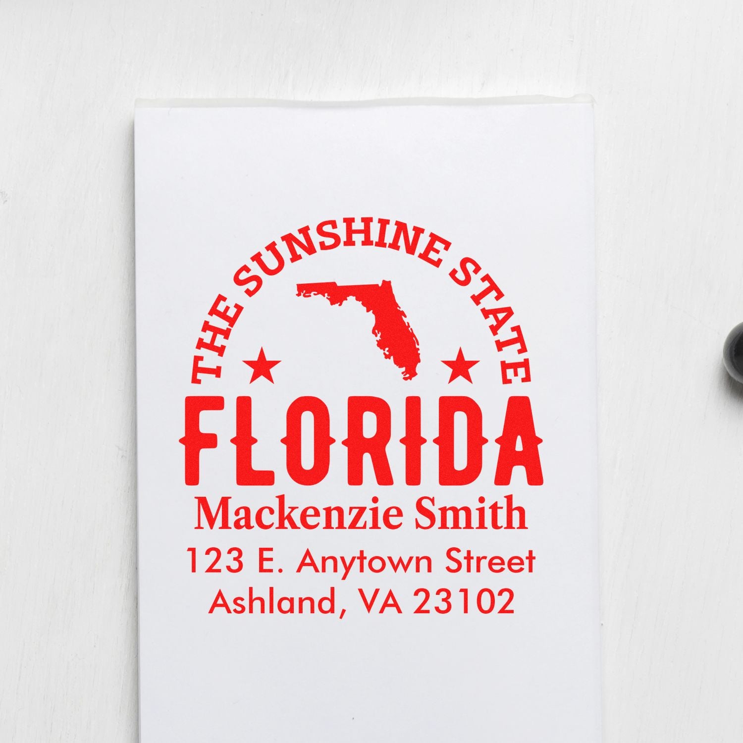 Custom Florida rubber stamp with Sunshine State design, personalized name, and mailing address for return envelopes.