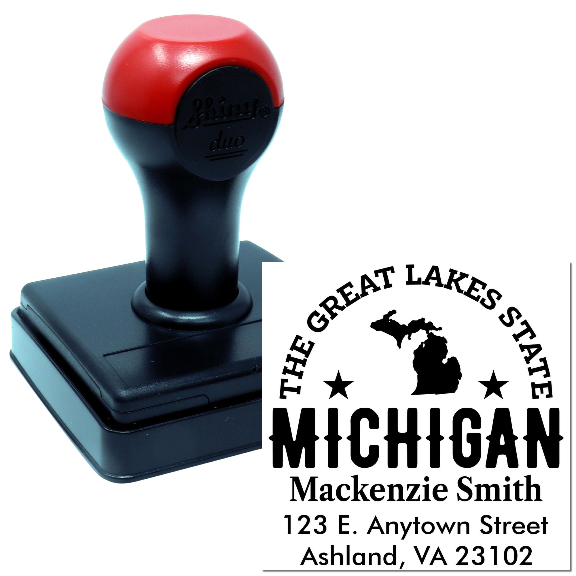 Custom self-inking rubber stamp with Michigan Great Lakes State design and return address for personalized mail.