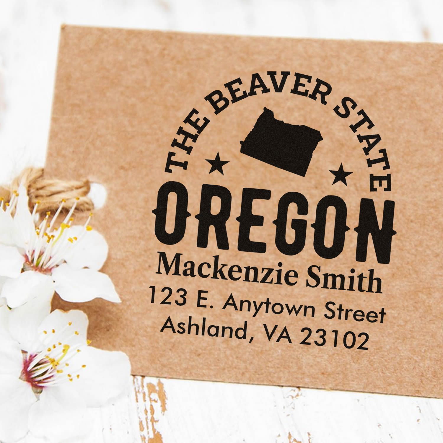 Personalized Oregon return address rubber stamp with Beaver State design, name, and mailing address.