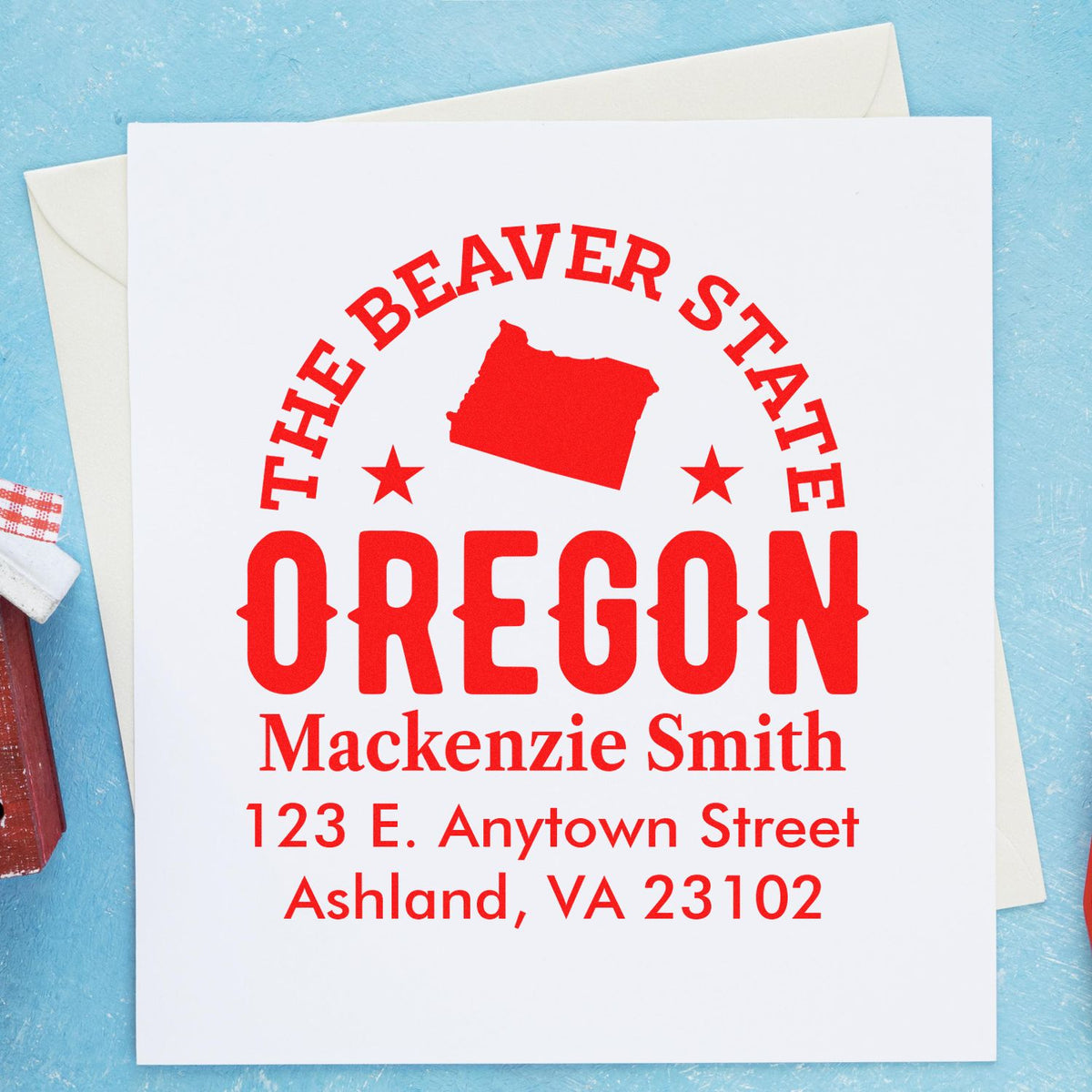 Personalized Oregon return address rubber stamp with Beaver State design, Mackenzie Smith, Ashland, VA 23102.