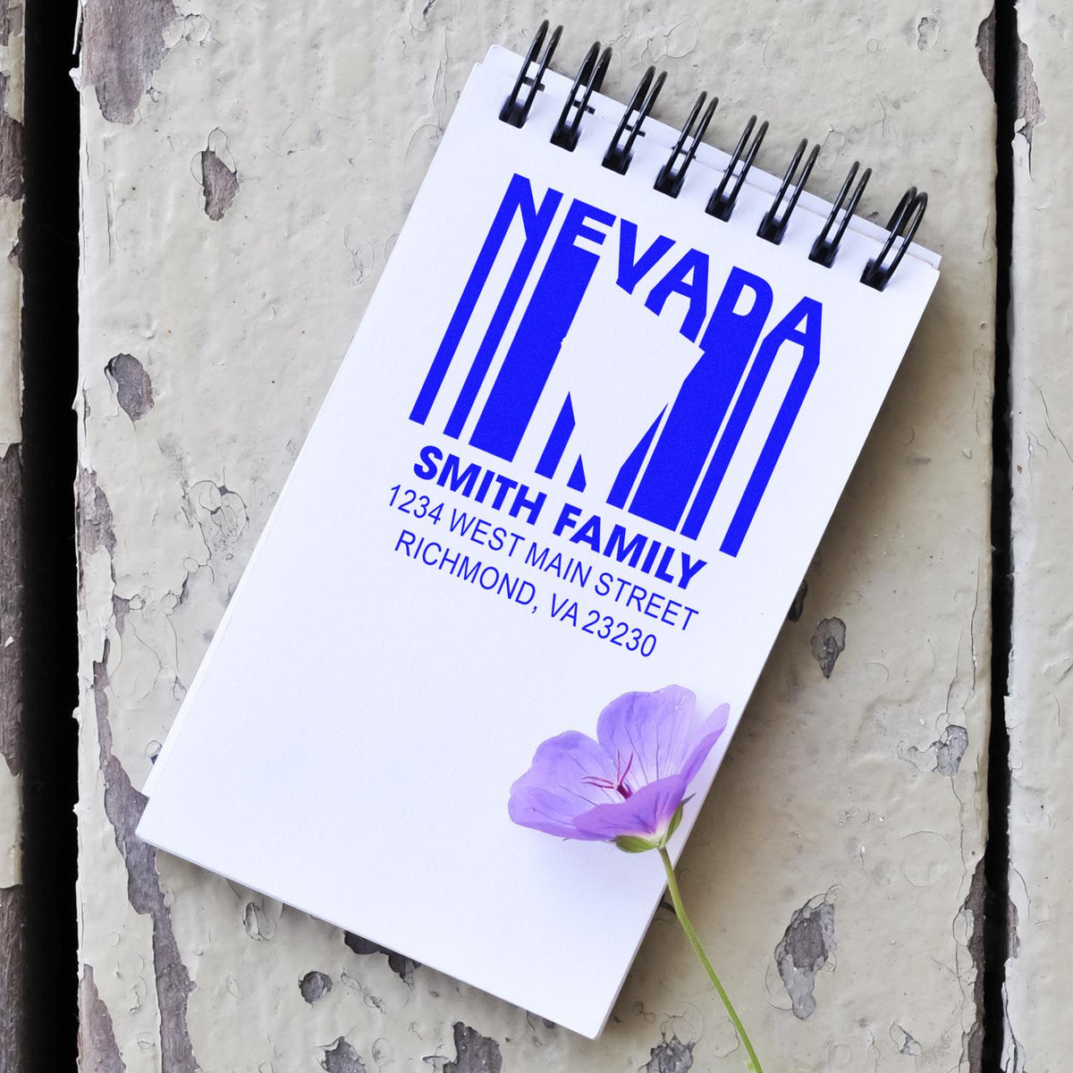 Custom family return address rubber stamp with Nevada Smith name and Richmond, VA address on a notepad mockup