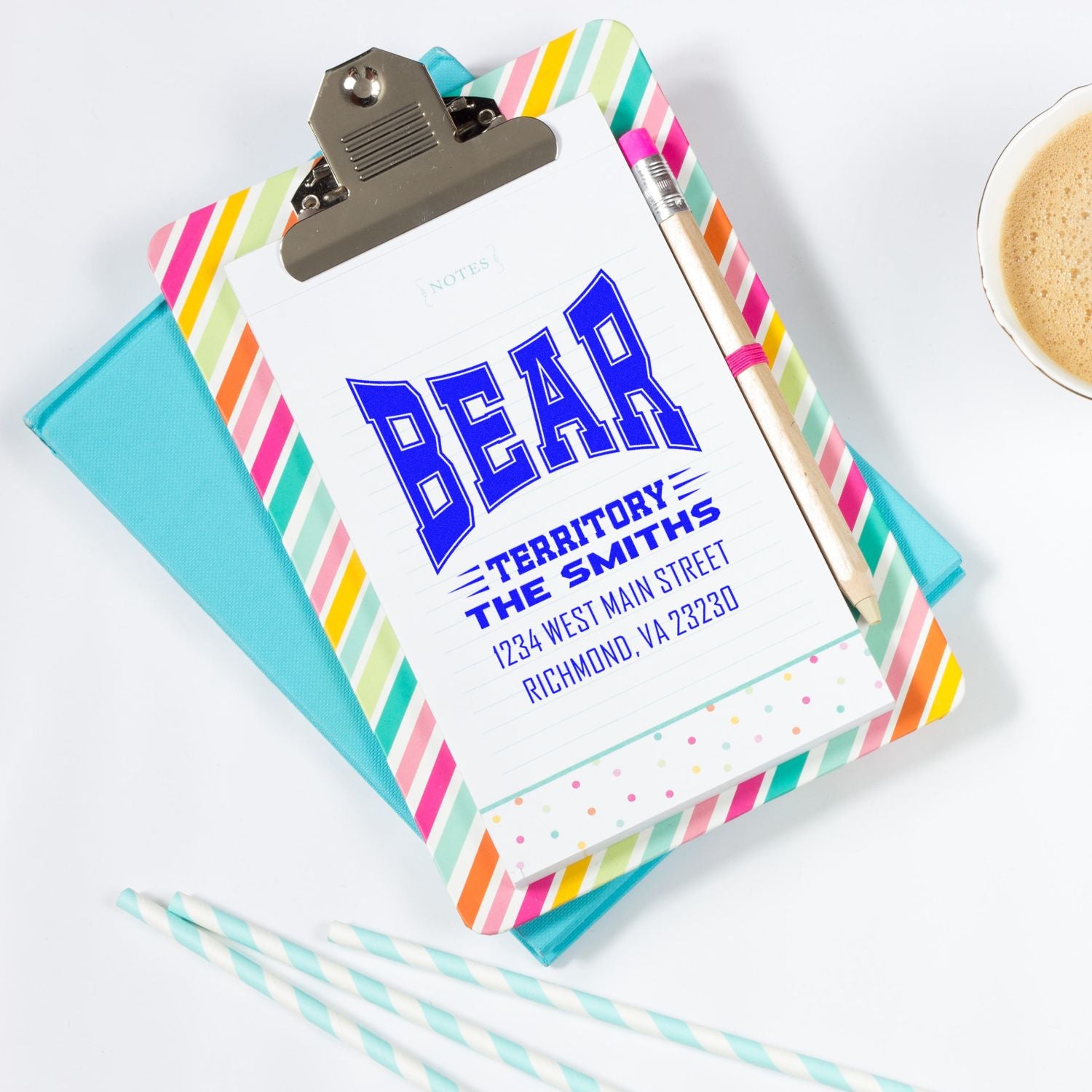 Custom Bear Territory rubber stamp with The Smiths family name and return address on a colorful clipboard.