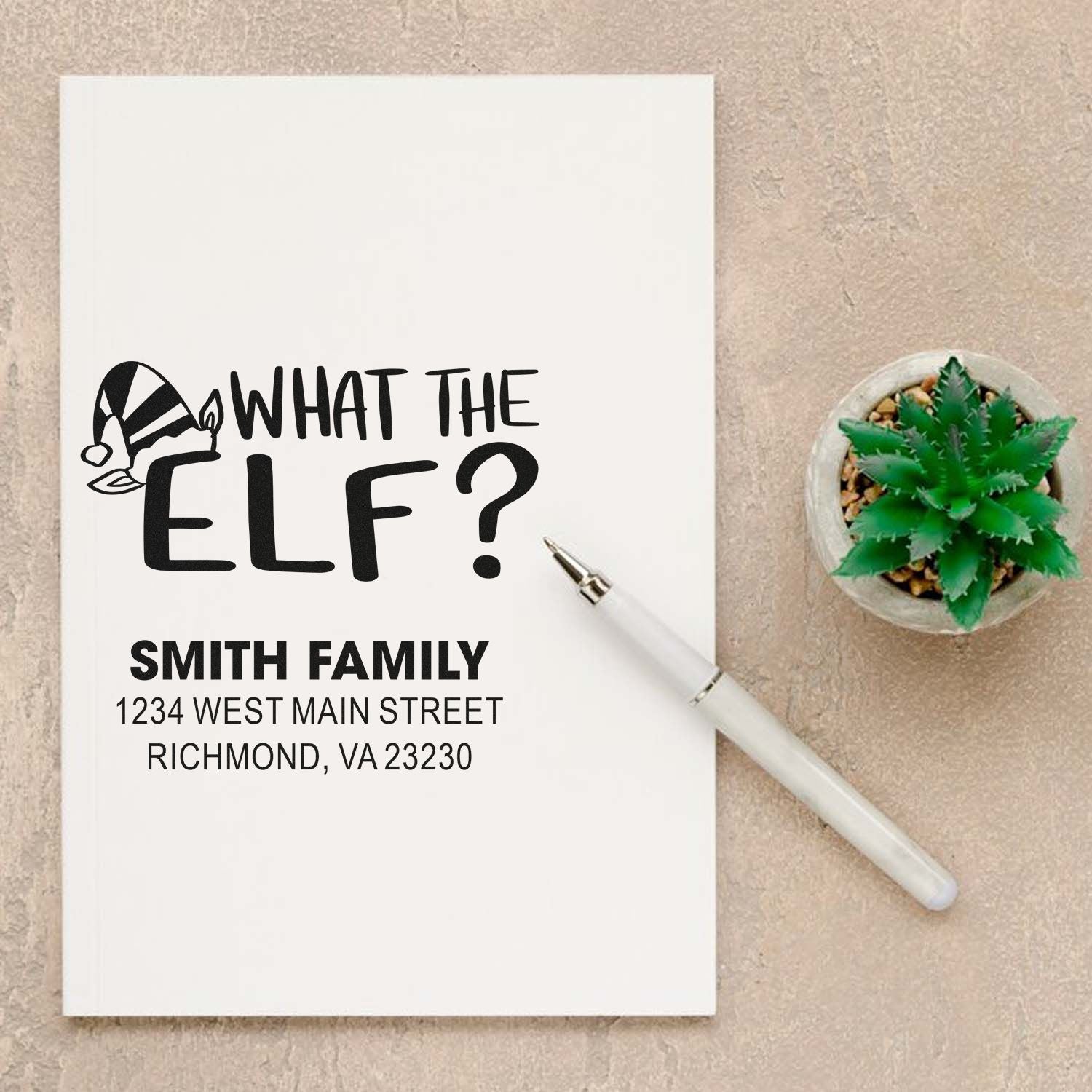 Custom rubber stamp design reading What the Elf? with Smith Family return address, ideal for holiday cards and mailings.