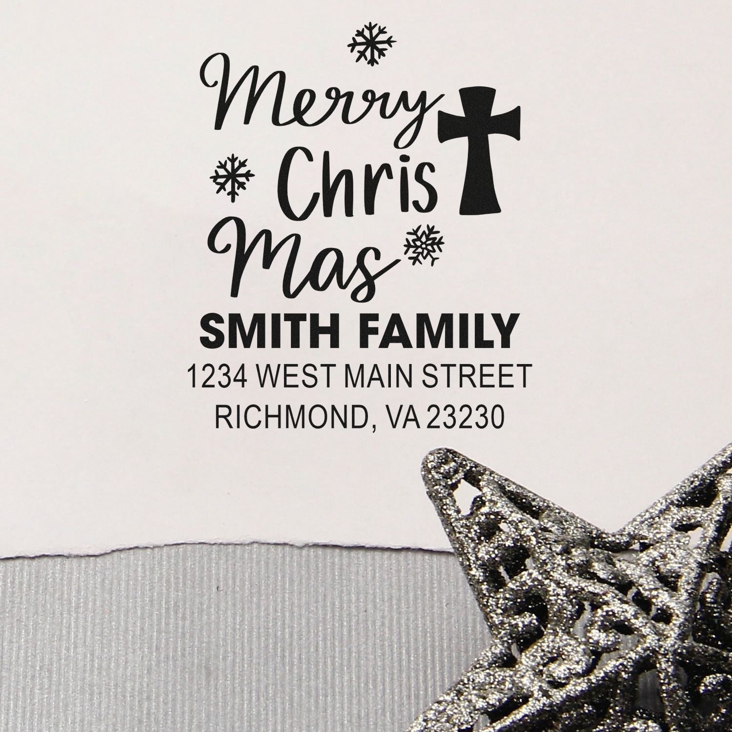 Custom Merry Christmas return address rubber stamp with snowflakes, cross, and Smith family address for holiday mailing.
