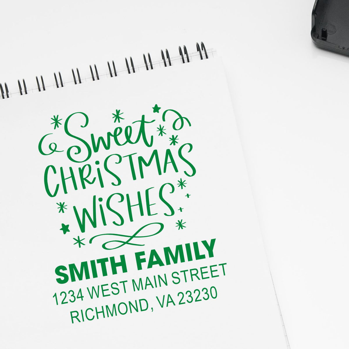Personalized Christmas rubber stamp with Sweet Christmas Wishes, Smith family name, and return address for holiday cards.