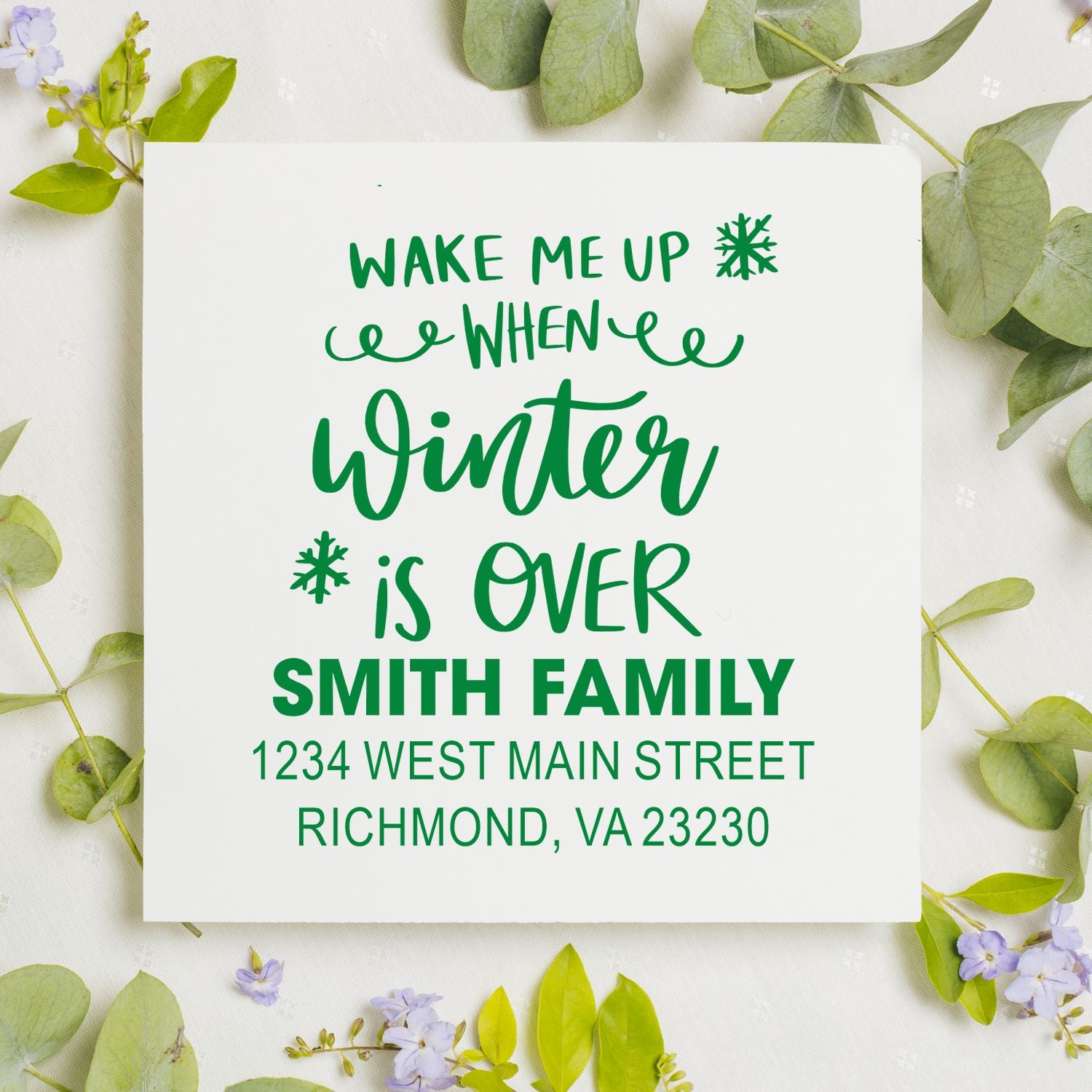 Custom rubber stamp design reading Wake me up when winter is over with Smith Family name and return address.