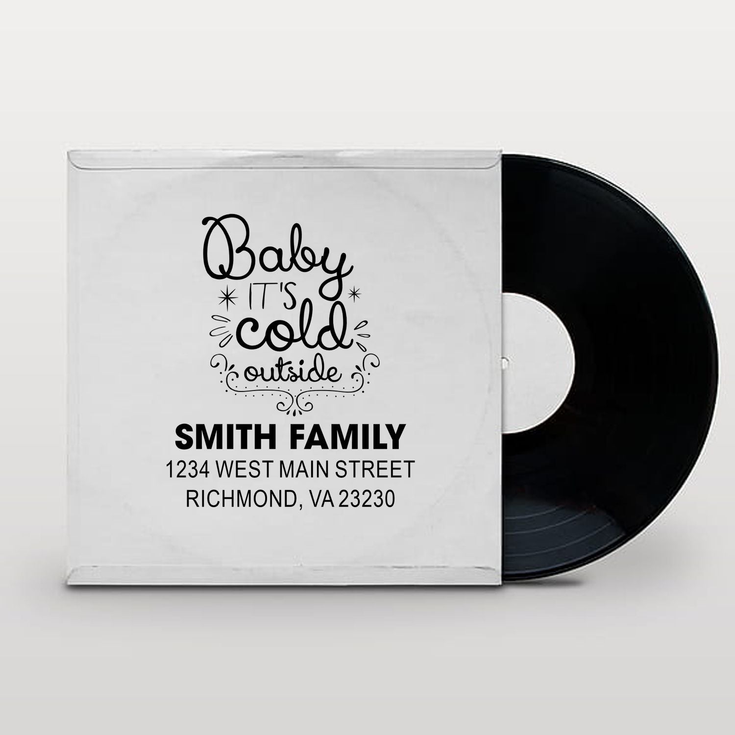 Personalized rubber stamp for holiday mailings featuring Baby Its Cold Outside and Smith Family return address.