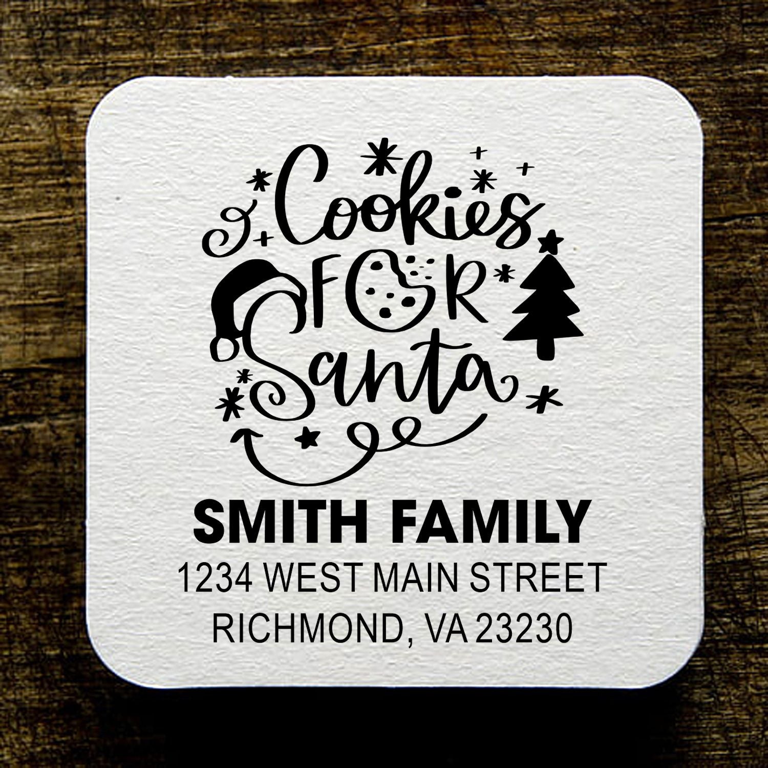 Custom Christmas rubber stamp with Cookies for Santa design, Smith Family name, and return address for holiday mail.