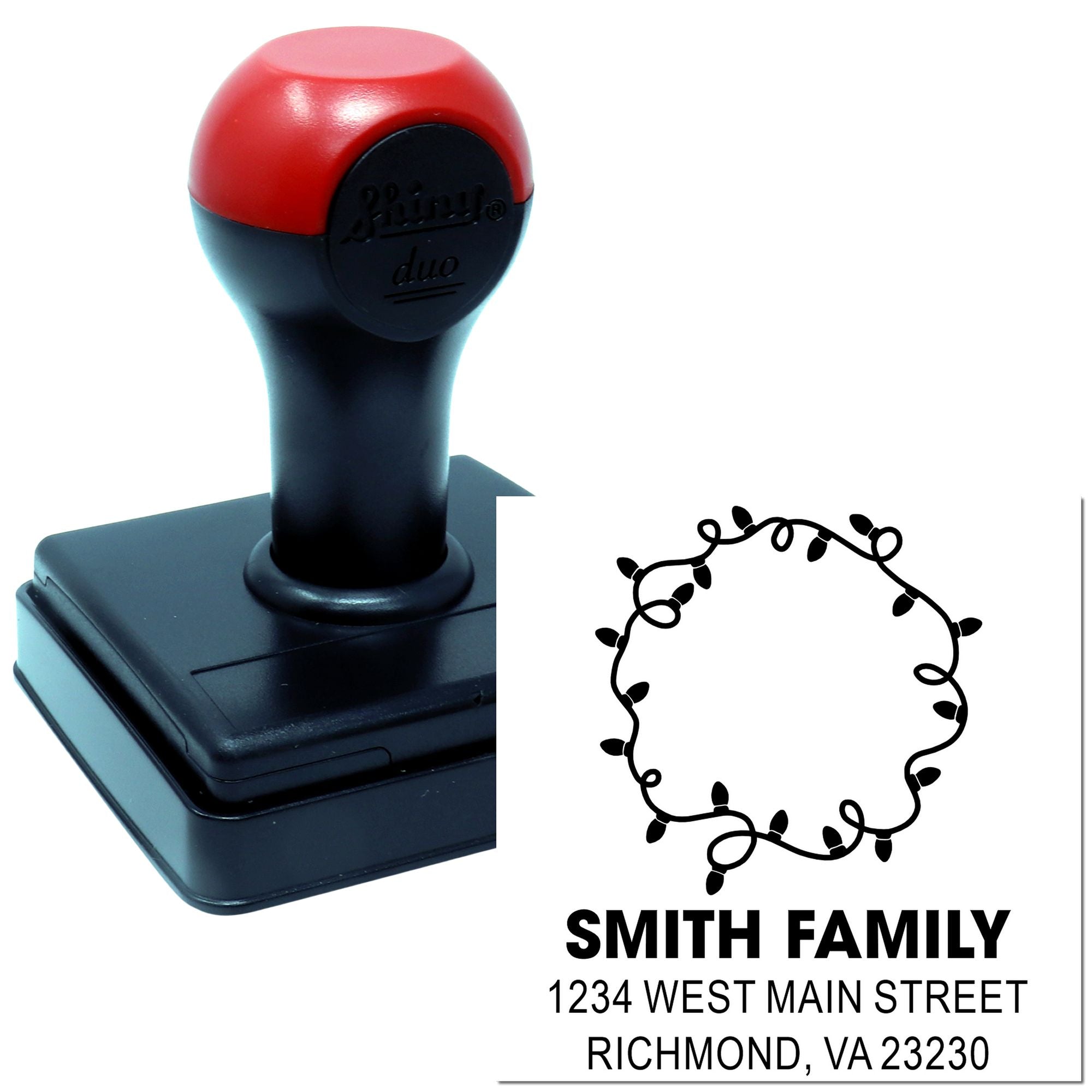 Custom self-inking return address rubber stamp with leafy wreath design, personalized Smith Family name and mailing address.