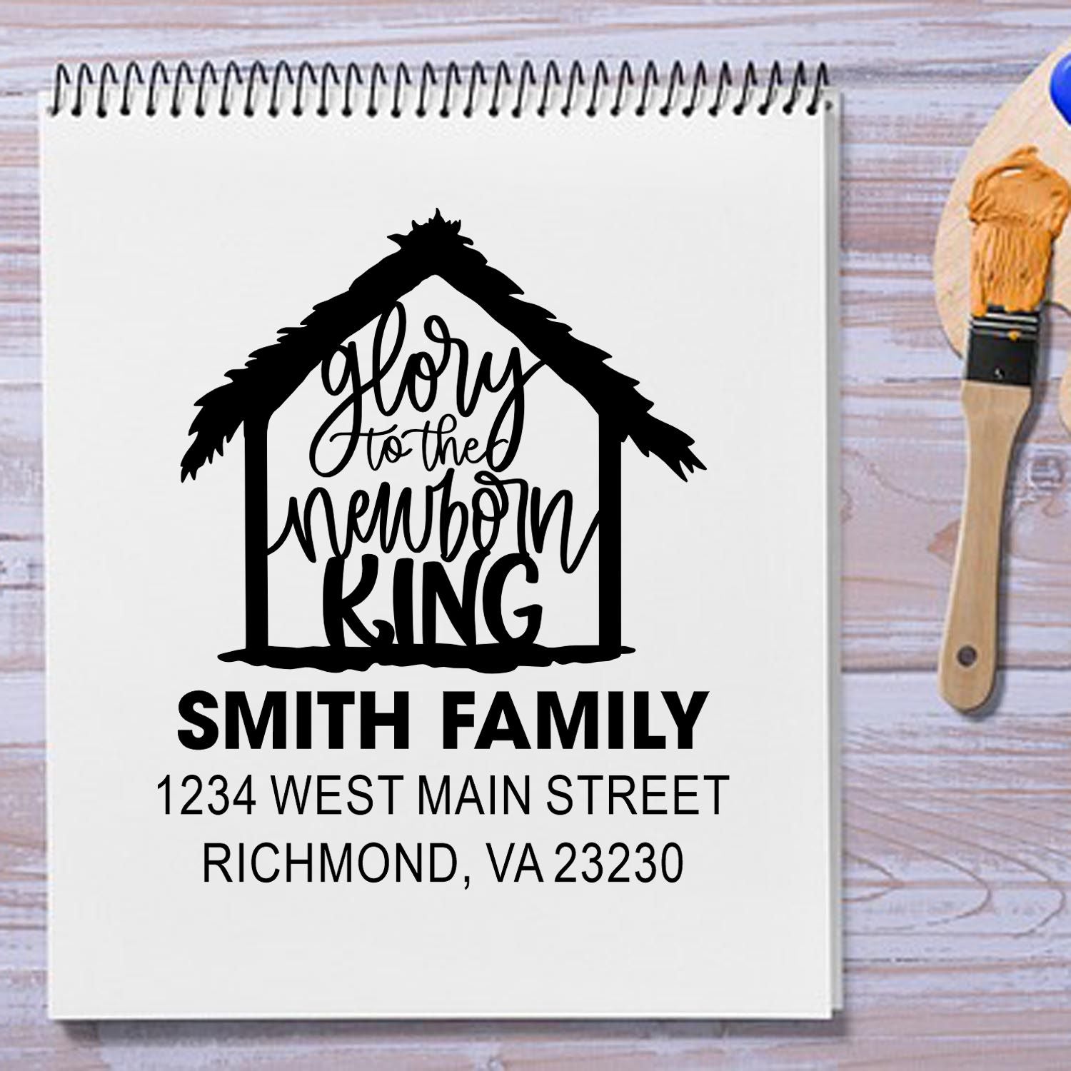 Personalized rubber stamp design with Glory to the Newborn King house art, Smith family name, and return address for Christmas cards.