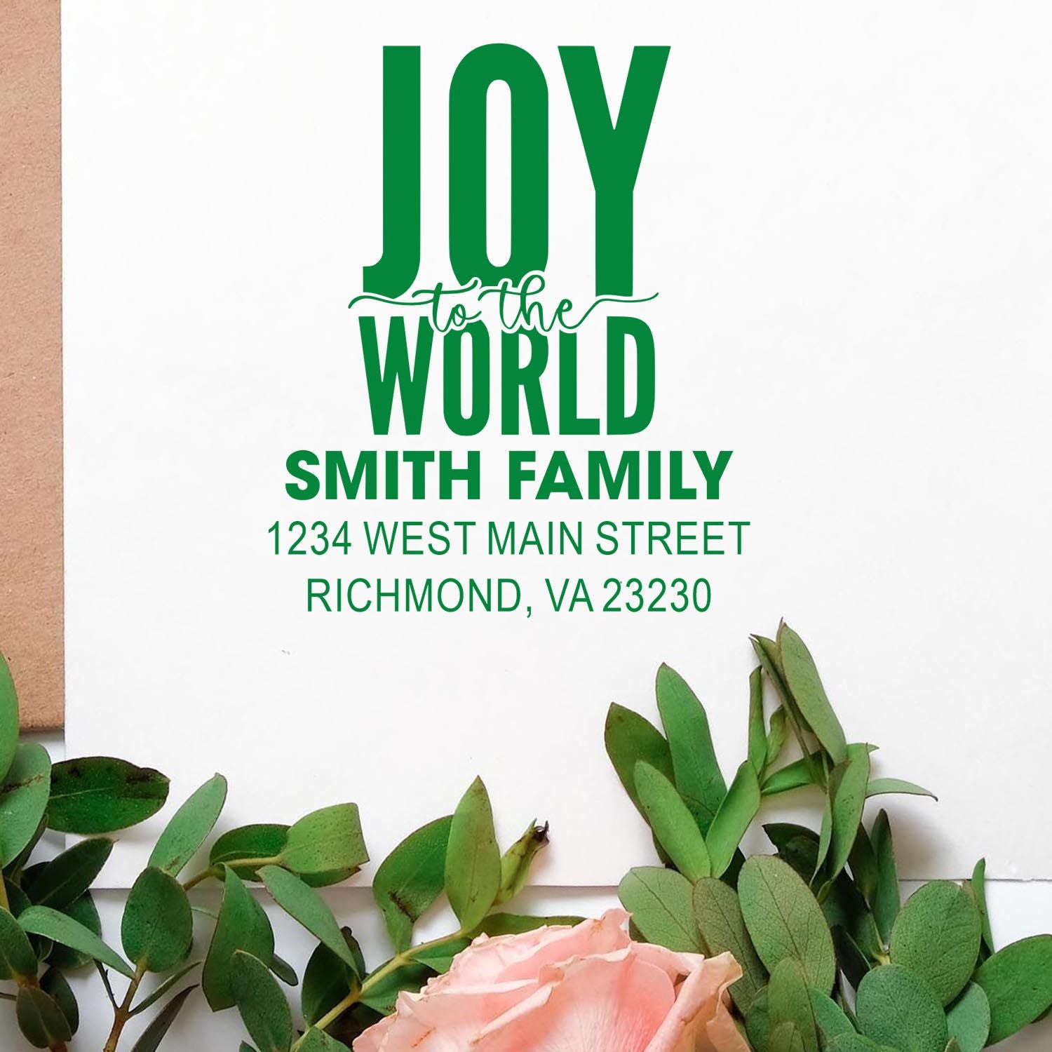 Custom holiday rubber stamp with Joy to the World Smith Family return address for festive cards and mailings.