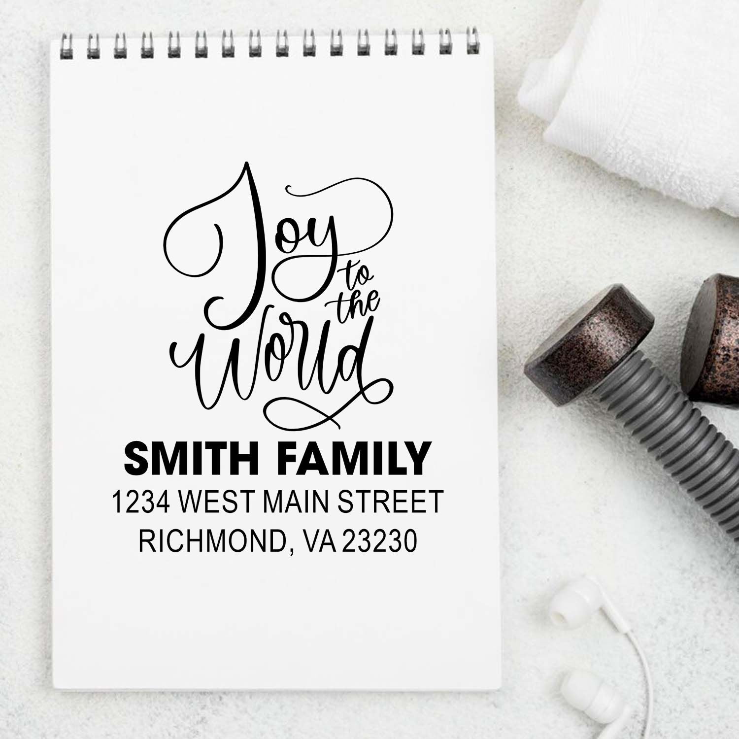 Custom Joy to the World rubber stamp with Smith family address for holiday cards and envelopes.