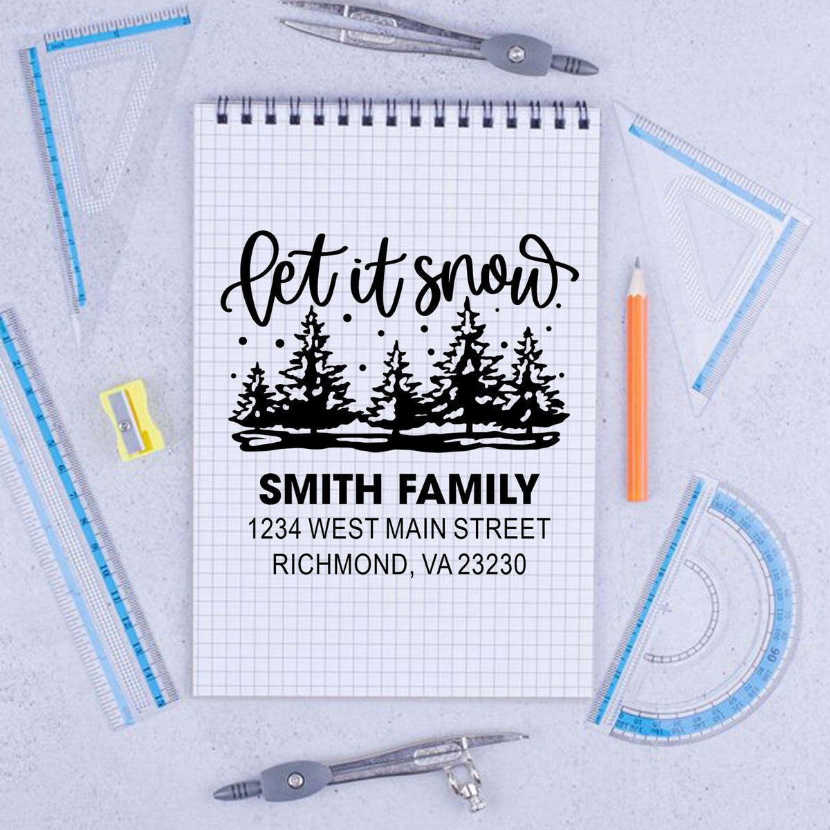 Custom rubber stamp with let it snow, pine trees, and Smith Family address for holiday cards and envelopes.