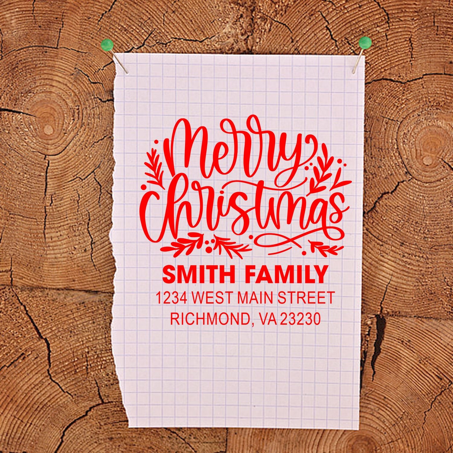 Personalized Merry Christmas return address rubber stamp with festive holiday script for family mailing cards.