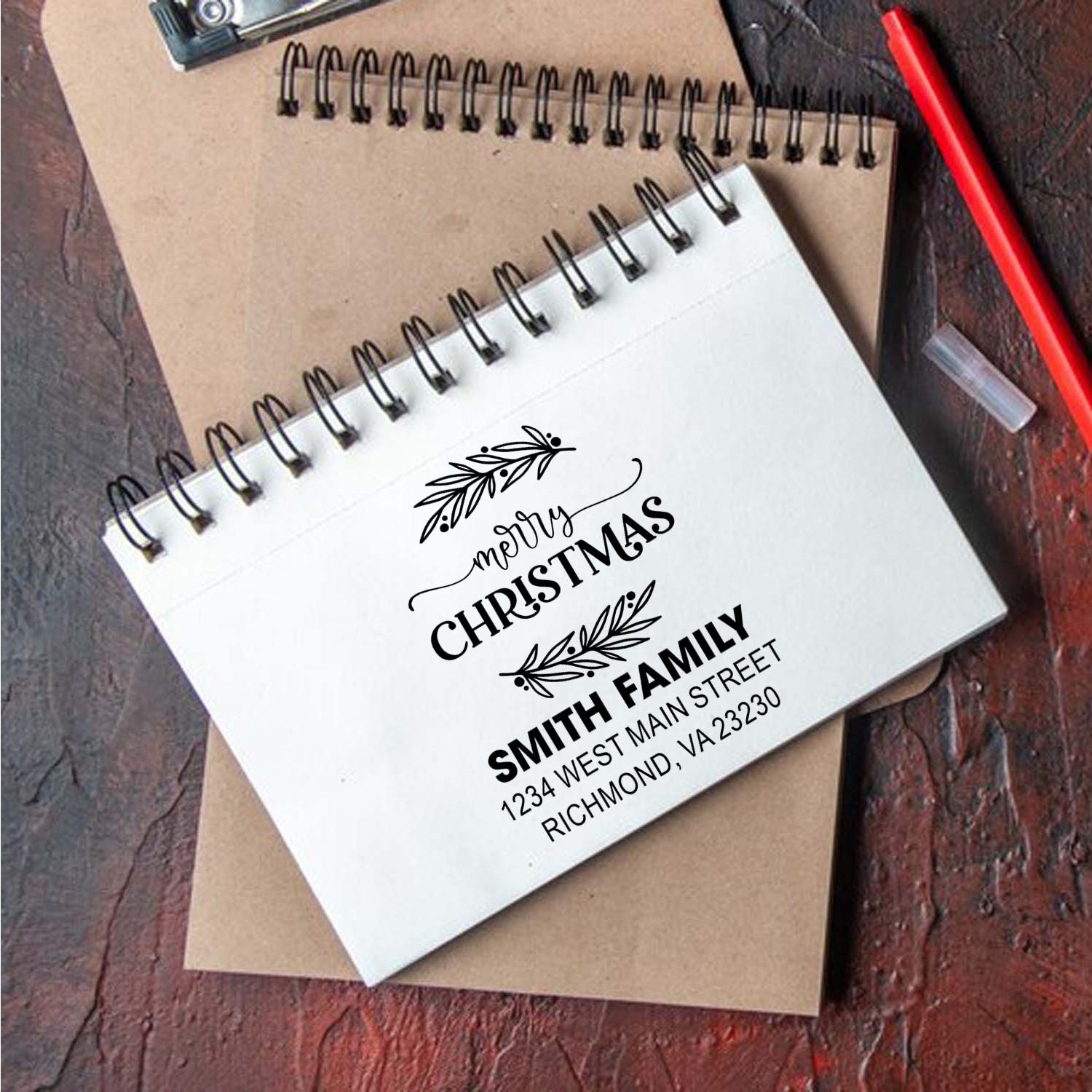 Custom holiday return address rubber stamp with Merry Christmas design for personalized Christmas cards and envelopes.